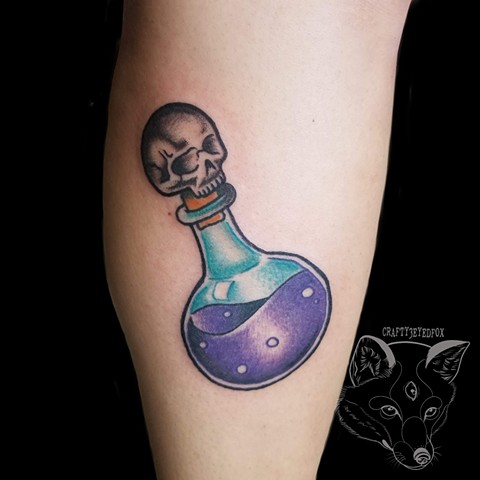 Potion bottle tattoo in traditional style on lower leg