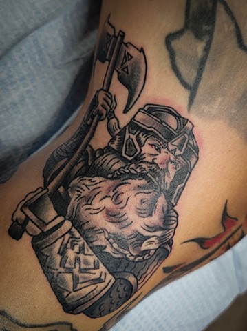 Lord of the Rings Gimli traditional black amd Grey tattoo on leg by Gina Matuo of Copper Fox in Kissimmee Florida nicest tattoo shop