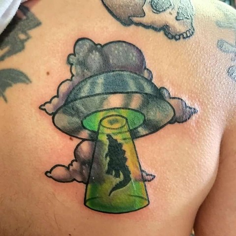 UFO tattoo, Godzilla tattoo, tattoos, tattooing, tattooshop, Kissimmee tattooshops, tattooshops near disney 