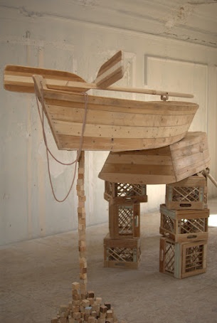 Sculpture made from reclaimed lumber. 