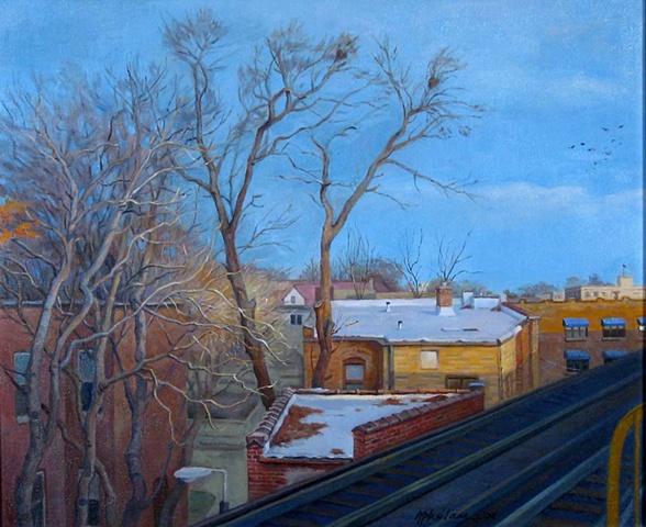 view from elevated tracks on winter morning with roofs and trees
