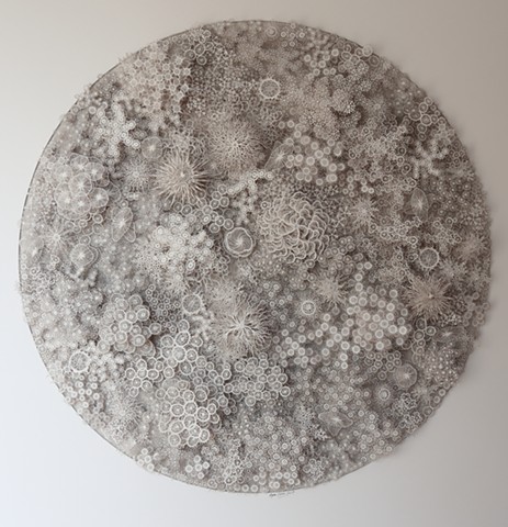 A paper sculpture depicting the variety of bacteria in the human microbiome
