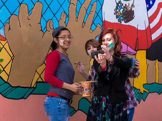 Restoring vandalized "Immigration is Beautiful" mural in Wichita KS