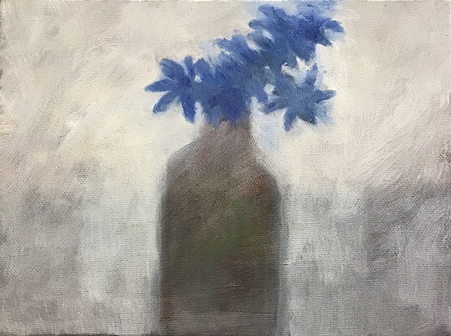 Vase of blue flowers