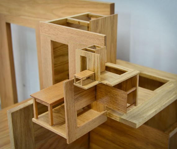 Closeup of Fractal Architecture shows repeating apartments and tables. 