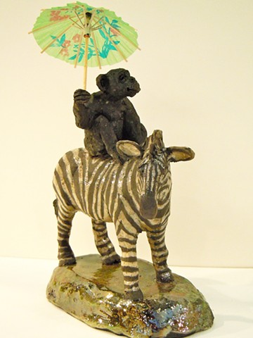 raku ceramic monkey and zebra