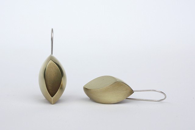 Almond shell earrings in brass by Sara Owens