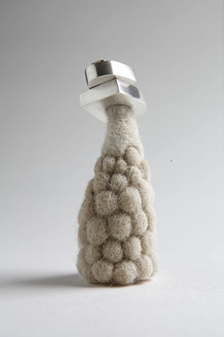 Adaptation 3 (brooch): wool, sterling silver; needle felted, formed, fabricated by Sara Owens