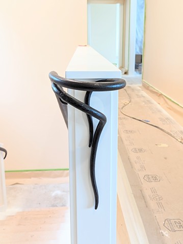 Interior stair rail volute