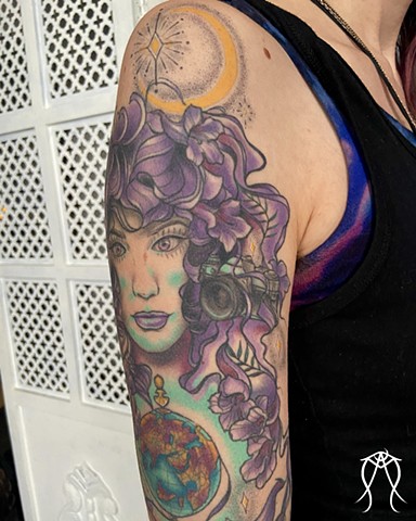 This is a sleeve tattoo  neo-traditional inspired by a literary character named witch baby done in color by female tattoo artist Amanda Marie in her private studio in central New York 