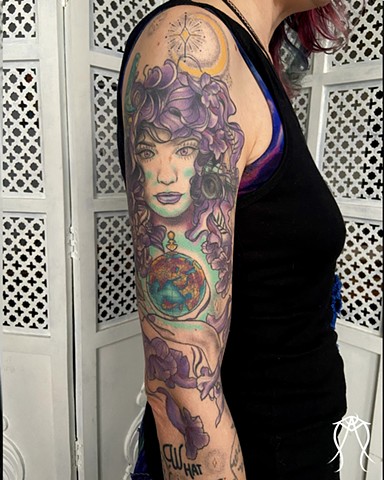 This is a sleeve tattoo  neo-traditional inspired by a literary character named witch baby done in color by female tattoo artist Amanda Marie in her private studio in central New York 