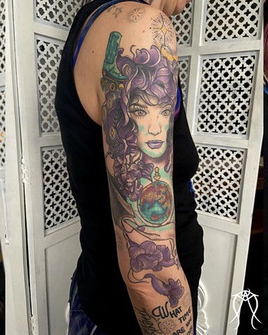 This is a sleeve tattoo  neo-traditional inspired by a literary character named witch baby done in color by female tattoo artist Amanda Marie in her private studio in central New York 