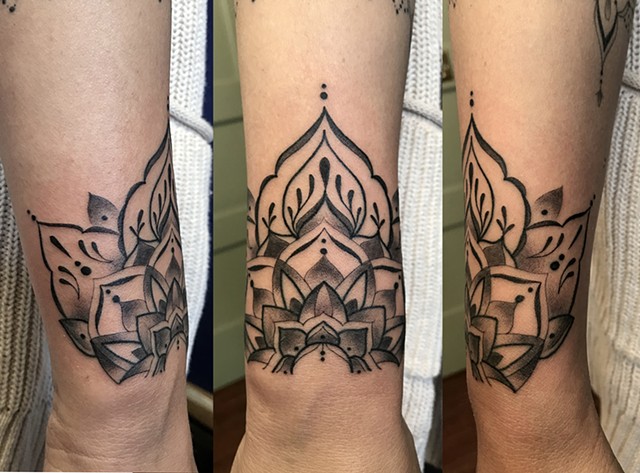 this is a delicate ornamental wrist tattoo done in black and grey by Amanda Marie female tattoo artist and tarot reader in los Angeles California