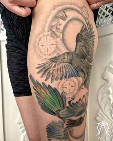 This is a color tattoo done by female tattoo artist Amanda Marie in central New York it features a crow and magpie with two moons and stars done in a fine line style of tattooing Amanda is a multidisciplinary artist and witch as well as herbalist and tarot reader and  loves creating nature based and spiritual tattoos