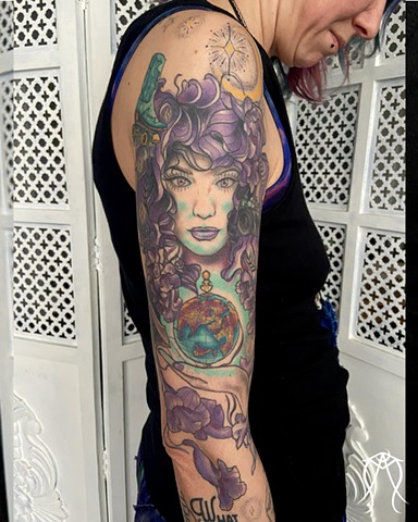 This is a sleeve tattoo  neo-traditional inspired by a literary character named witch baby done in color by female tattoo artist Amanda Marie in her private studio in central New York 