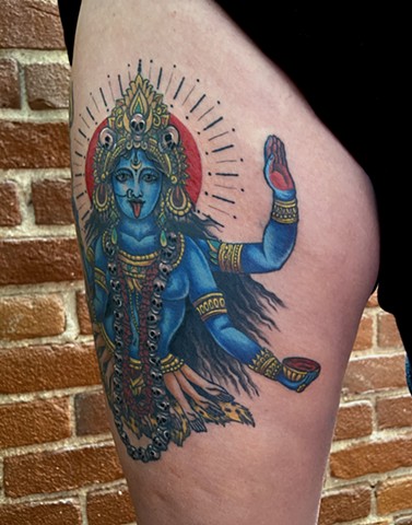 this is a tattoo done in color of the Hindu goddess Kali the divine mother spiritual and sacred done by Amanda Marie Female tattoo artist and tarot reader in Los Angeles California at her private studio ace of wands tattoo