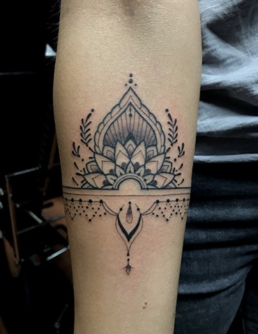 this is a delicate ornamental mandala tattoo done in black and grey by amanda marie female tattoo artist and owner of ace of wands tattoo in san pedro los angeles california in the south bay 