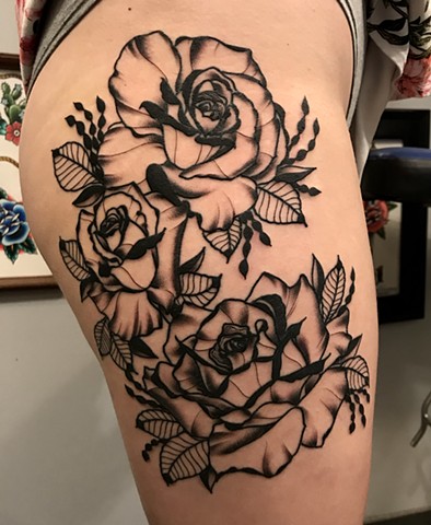 this is a black work rose tattoo done by amanda marie tattooer at ace of wands in san pedro los angeles california it is an intimate tattoo studio with character 