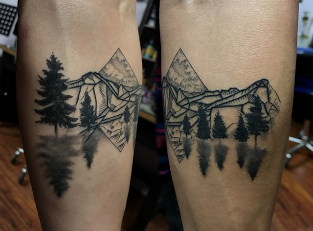 this is a mystical mountain tattoo that was done with intention to help my client stay grounded done in black and grey embodying and with magick by amanda marie tattooer in Los Angeles San Pedro California at private studio upscale ace of wands tattoo