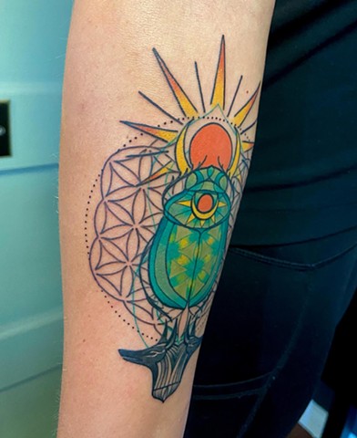 Intuitive Tattoo Art by Female New York Tattoo Artist Amanda Marie of a scarab beetle with an Anubis head inspired by Egyptian art done in color 