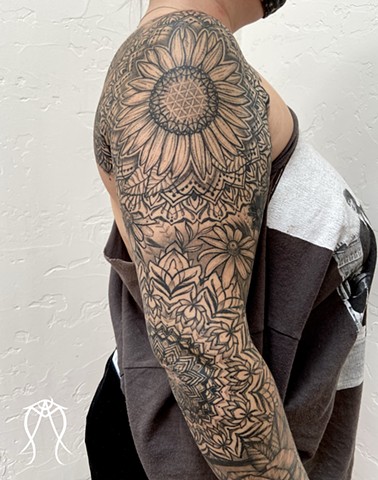 Intuitive Tattoo Art by Female New York Tattoo Artist Amanda Marie of a floral mandala ornamental sleeve done in black and grey 