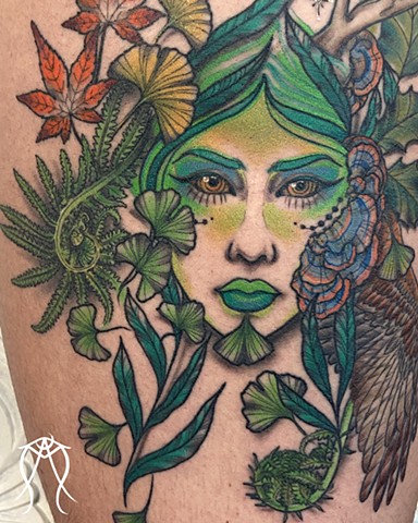 This is a color tattoo done of Mother Earth it is ornate detailed and nature based done by tattoo artist and tarot reader Amanda Marie at her private tattoo and tarot studio in Scipio center New York near Ithaca New York east coast tattoo ace of wands tat