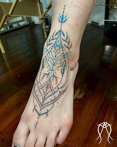 Delicate, beautiful and powerful this ornamental tattoo was done on both feet by Amanda Marie female tattoo artist in Scipio center New York close to Ithaca in her private tattoo studio ace of wands tattoo, tattoo and tarot studio 