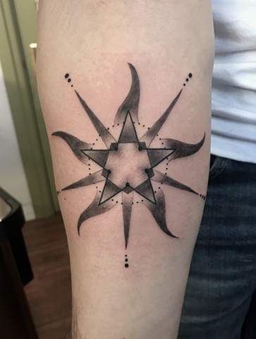 this is a delicate pentagram mandala tattoo done by amanda marie female tattoo artist in los angeles san pedro south bay california owner of ace of wands tattoo this is a sacred and spiritual pagan tattoo 