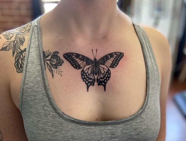 Intuitive Tattoo Art by Female New York Tattoo Artist Amanda Marie Of a monarch butterfly done in black and grey 