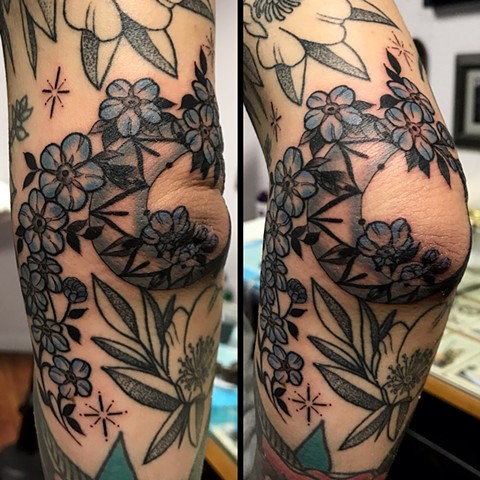 this is a tattoo of moon flowers and stars done in a delicate ornamental style illustrative by amanda marie tattooer female tattoo artist in los angeles san pedro california tattooing at ace of wands tattoo sacred spiritual space 