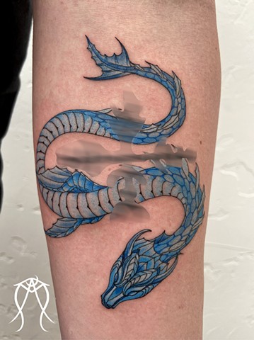 Intuitive Tattoo Art by Female New York Tattoo Artist Amanda Marie Of a reiki water dragon done in color 