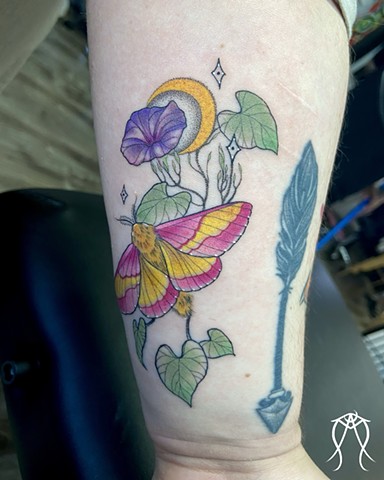 This is Rosy Maple Moth & Morning Glory Tattoo done by Amanda Marie female tattoo artist and witch in her private studio in central New York color moth tattoo with botanical floral plant art