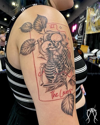 This is a tarot tattoo of the lovers card done by Amanda Marie female tattoo artist and witch in central New York lady tattoo artist intuitive artist private studio fine line tattoos 