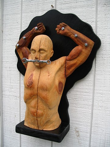 wood sculpture figure torso bolts wrench male