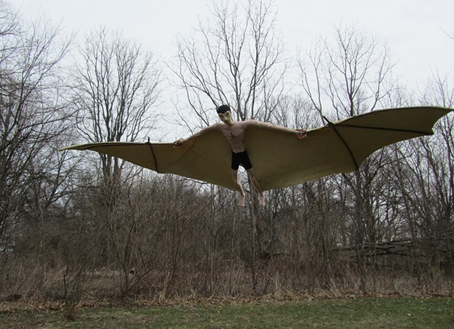 bat sculpture man wings