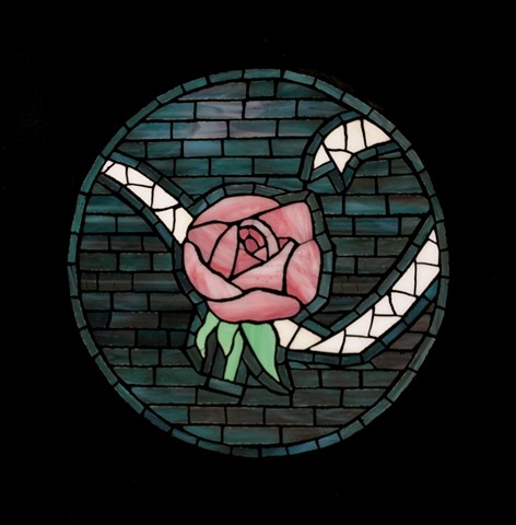 A mosaic of a single pink rose