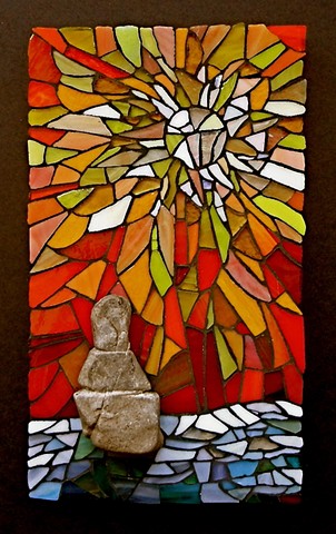stained glass and rock mosaic inukshuk