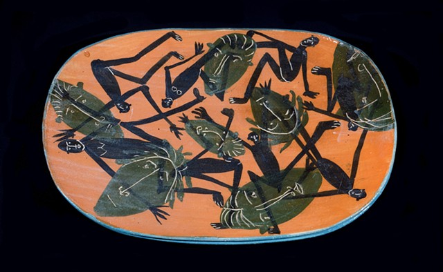 orange platter with figures 