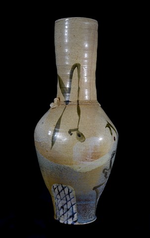brown vase with drawings