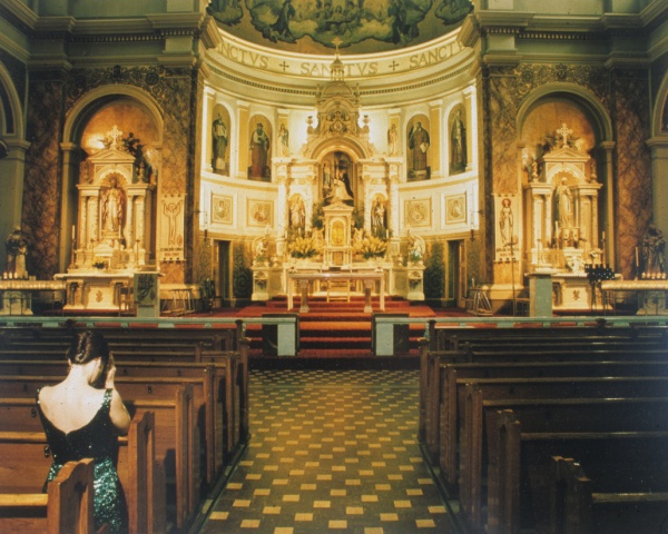 Kneeling in pew at St. Hyacinth's Polish Church