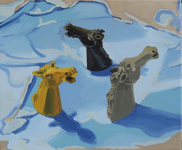 still life painting, map of the pacific with horse finder puppets