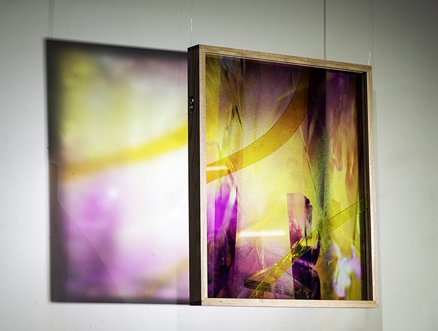 Natalie Hunter %Piecing Light, Mirror Window 01% 2025-2026 UV print on glass from 120mm negative, oak, varnish, hand cut and inlayed glass, light. 16" x 20" x 2". Suspended photo-based sculpture.