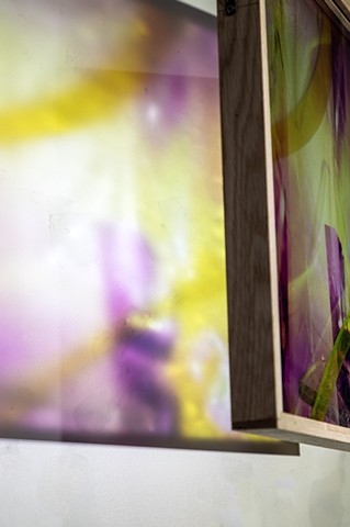 Natalie Hunter %Piecing Light, Mirror Window 01% 2025-2026 UV print on glass from 120mm negative, oak, varnish, hand cut and inlayed glass, light. 16" x 20" x 2". Suspended photo-based sculpture.