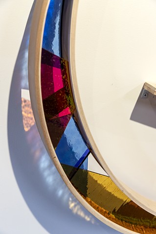 Natalie Hunter Phase Shift, Shades of Dawn 2022 | 2026 Hand shaped and curved birch, hand cut and mounted glass, colour film, light.  30" x 16" x 5" each, 60" x 60" installed.