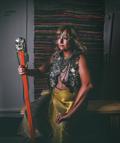 at Wilson’s Warrior Women series draws on the doctrine of strength in vulnerability, showing each subject with breasts bared, dressed in handmade armor that tells the stories of the battles they have fought and that readies them for the battles they have 