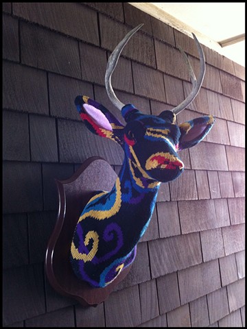 photograph of Sweaty Deer Faux Taxidermy 80s paisley sweater