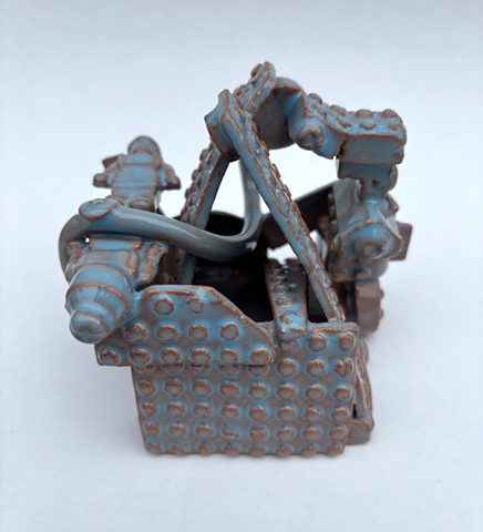 Toy Study: Blue LEGO Fort with Recumbent Figures.