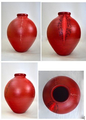 beautiful hand formed and painted stoneware vessel, finished with protective wax