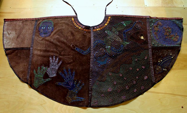 beadwork by ann laase bailey leather cape stitched with seed beads and shells