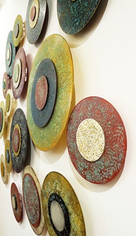 detail abstract circular paintings on acrylic panels dimensional wall sculpture